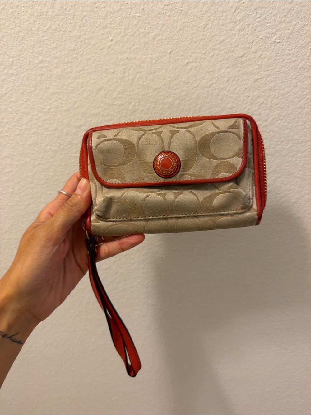Coach Signature Canvas Wristlet with Orange Trim
